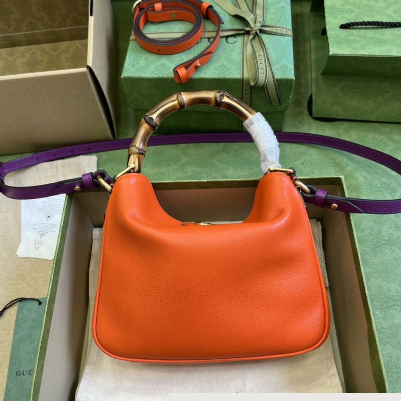 G*u*i top handle bags